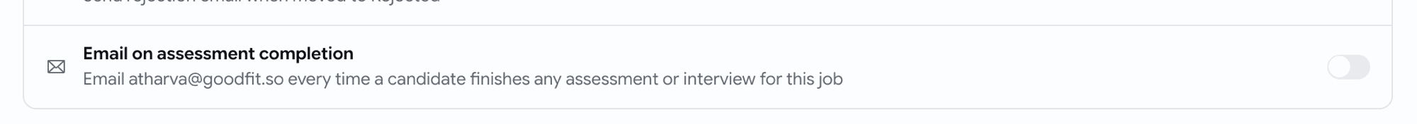 Email on assessment completion toggle on the job Settings tab, with the recipient's address spelled out