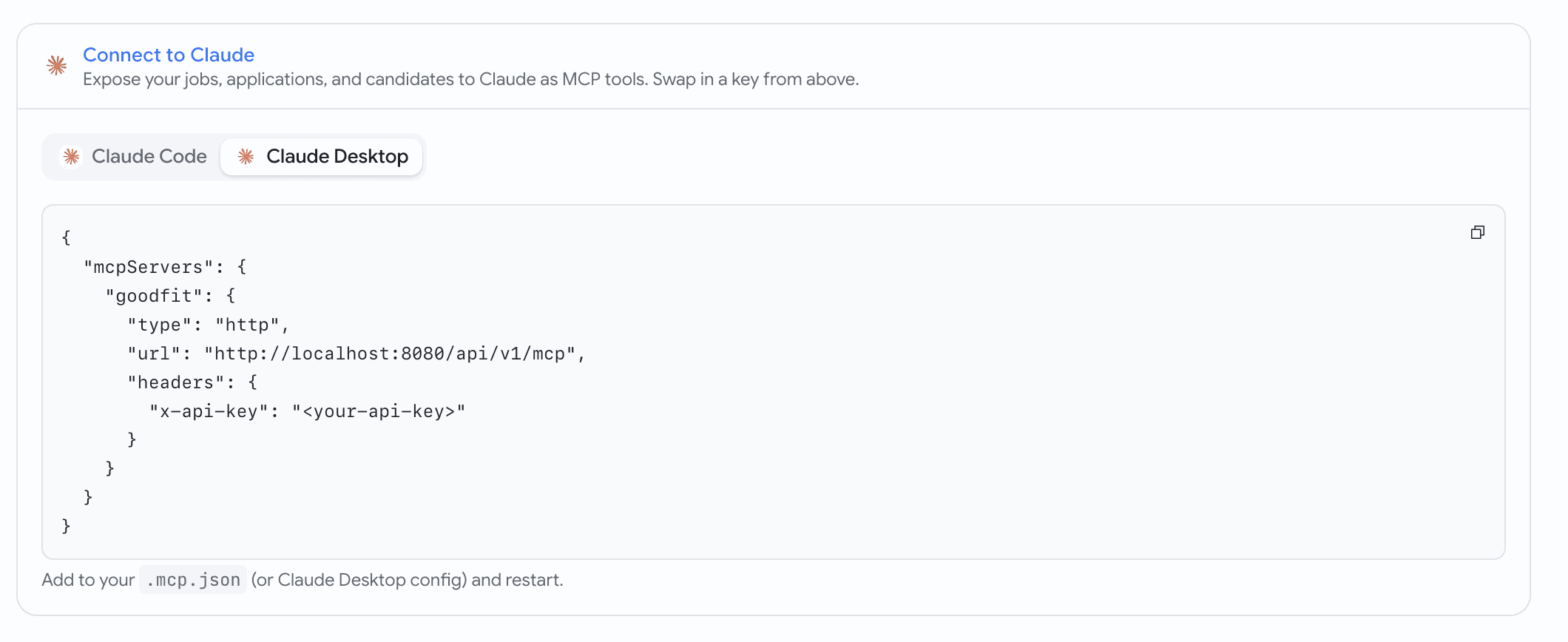 A Connect to Claude reference card with the Claude mark, a segmented Claude Code / Claude Desktop tab strip, and the generated command in a monospace block with a corner copy button